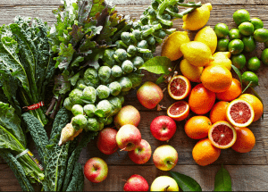 a group of fruits and vegetables on a wood surface Healthy Weight Loss Diets Wootton Bassett